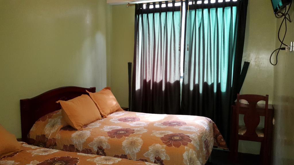 Hostal Los Lirios Loja Luaran gambar
